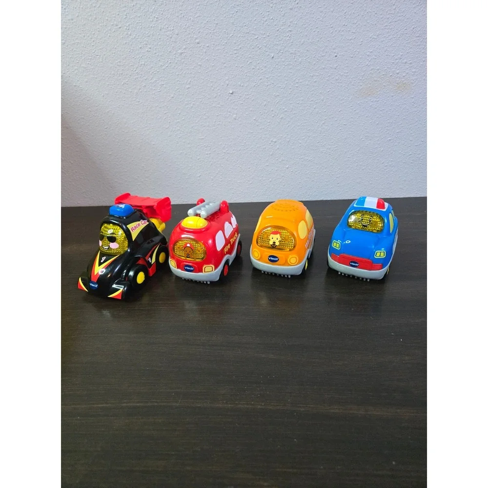 VTech Go Go Smart Wheels Toy Car Lot Race Car Fire Truck Van Police Car 4 Pack